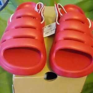 Ugg women size 9 red sport slides strap in back